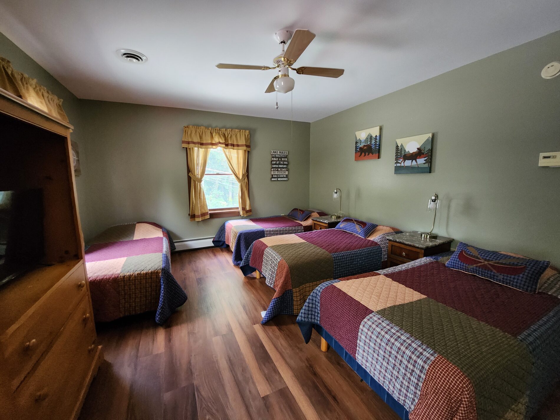 four beds in cabin bedroom